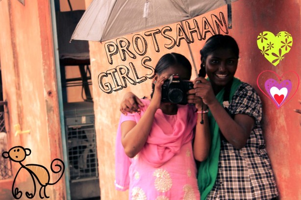 Protsahan's Anju and Sony, going click click in the Delhi rains! :-) Donate your cameras (DSLRs or simple point and shoots, or other second hand devices in good working condition that'll help our girls to express themselves and learn through words and clicks)